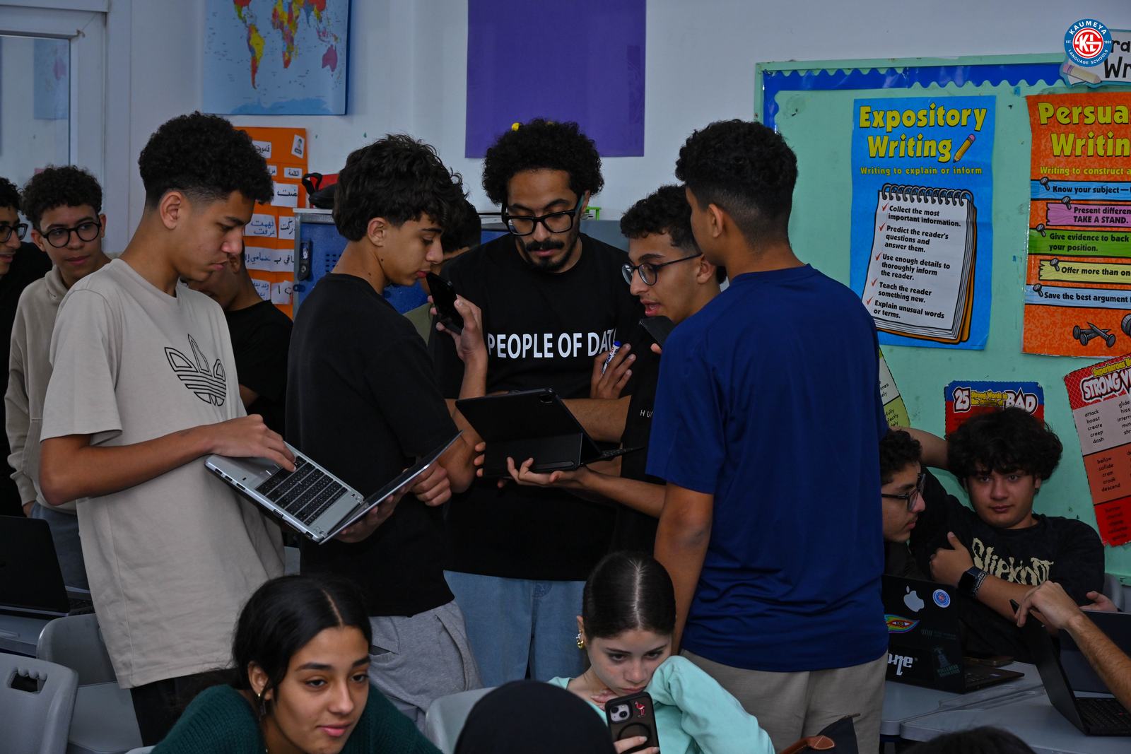 A People of Data mentor working with a team of students
